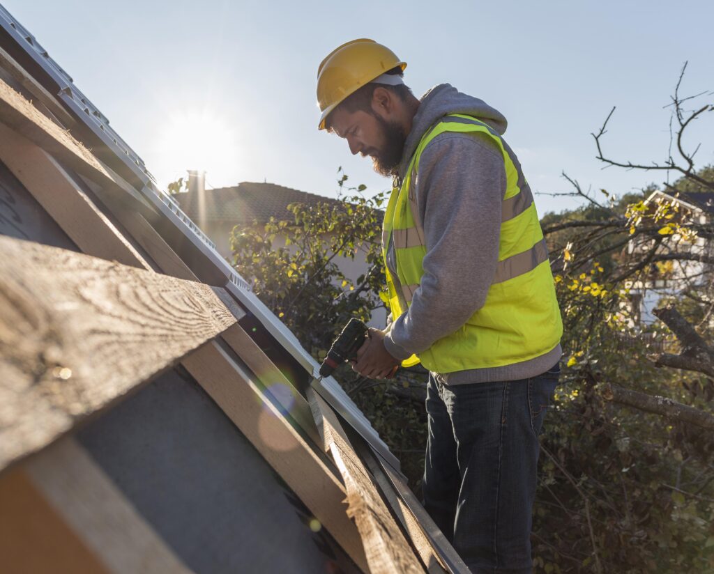Property manager inspecting a rental roof before hurricane season
